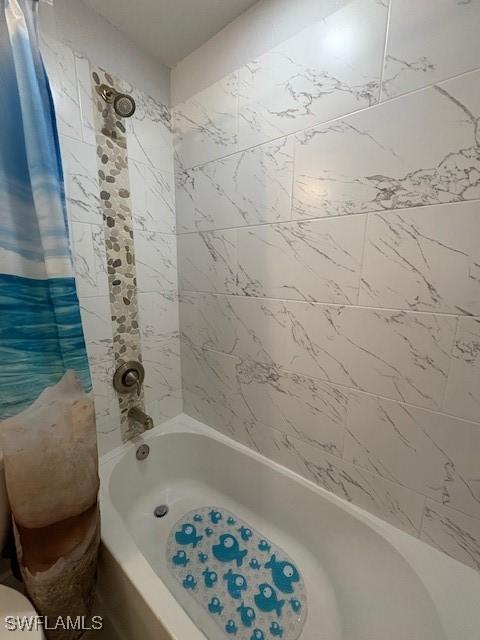 full bath with shower / bath combo