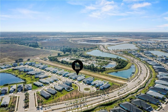 drone / aerial view featuring a water view