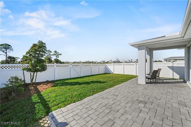 view of yard with a patio area