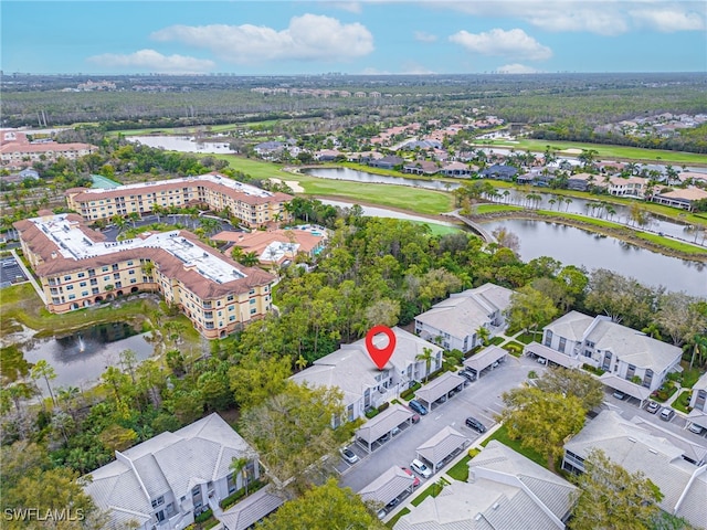 drone / aerial view with a water view