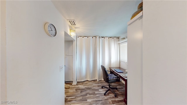 office space featuring wood-type flooring