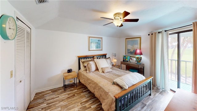 bedroom with access to exterior, a closet, ceiling fan, and light wood-type flooring