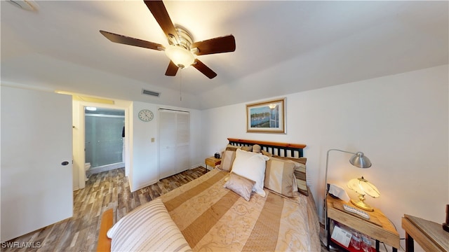 bedroom with ceiling fan, a closet, and light hardwood / wood-style flooring