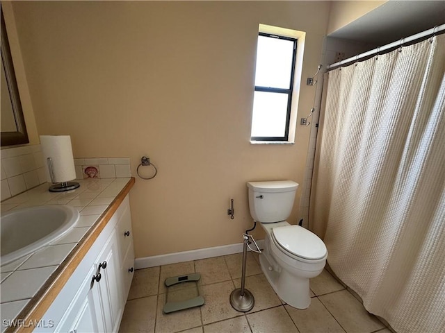 bathroom featuring decorative backsplash, tile patterned flooring, vanity, toilet, and a shower with shower curtain