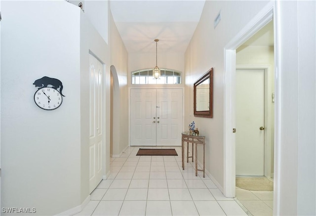 entrance foyer with light tile patterned floors