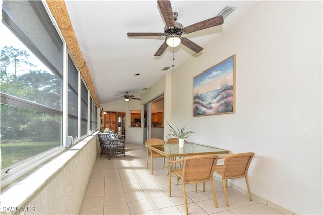 sunroom with vaulted ceiling