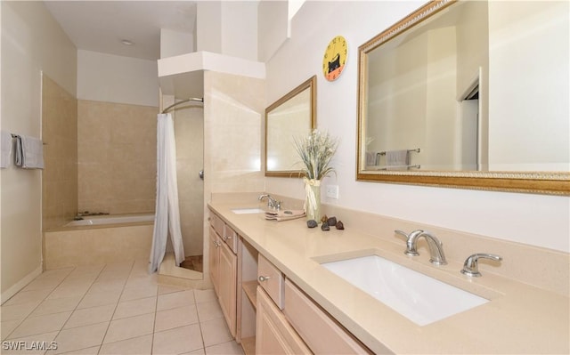 bathroom featuring vanity, tile patterned flooring, and shower with separate bathtub