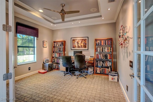 carpeted office space featuring baseboards, visible vents, recessed lighting, crown molding, and a raised ceiling