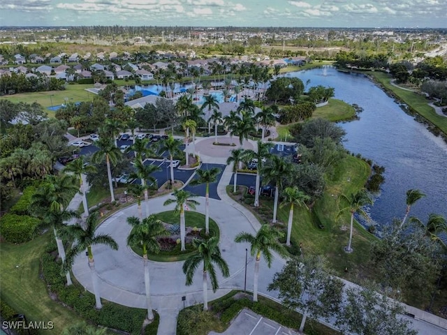 birds eye view of property featuring a water view and a residential view