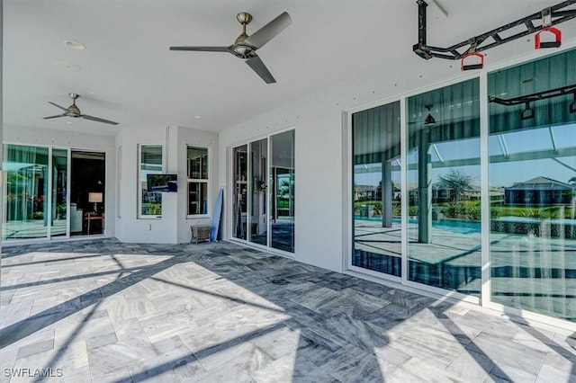 view of patio / terrace with ceiling fan