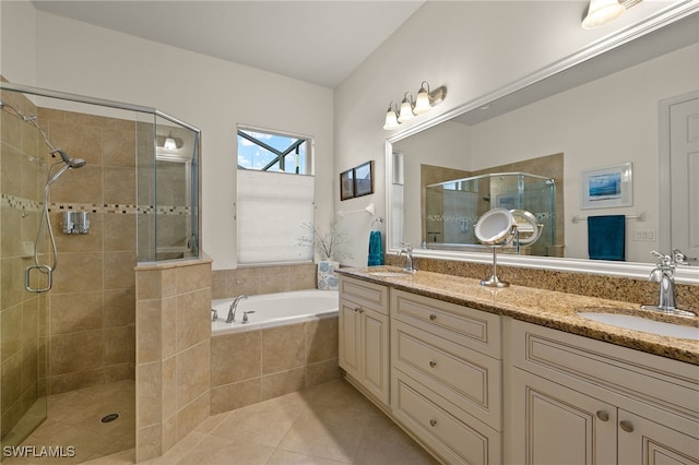 bathroom with vanity, plus walk in shower, and tile patterned flooring