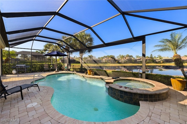 view of swimming pool with a patio, a lanai, a water view, and an in ground hot tub