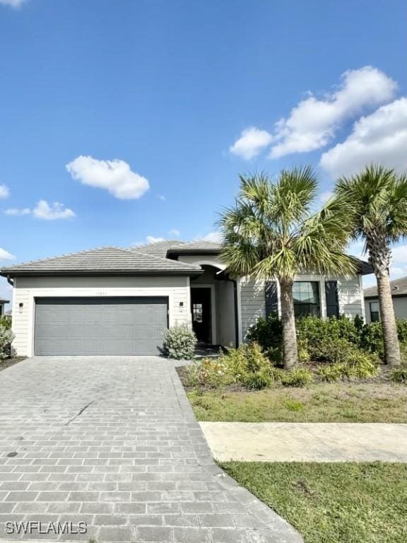 view of front of property featuring a garage