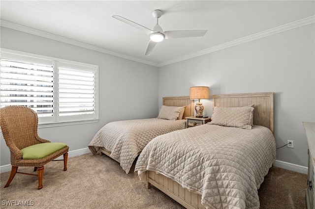 carpeted bedroom featuring ornamental molding and ceiling fan