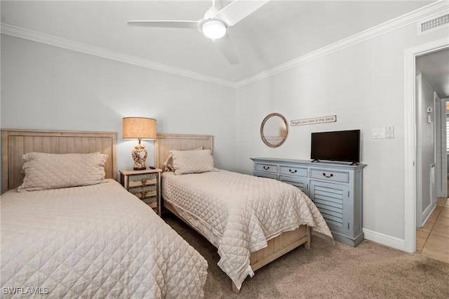 carpeted bedroom featuring crown molding and ceiling fan