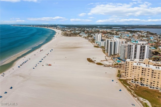 aerial view with a view of the beach and a water view