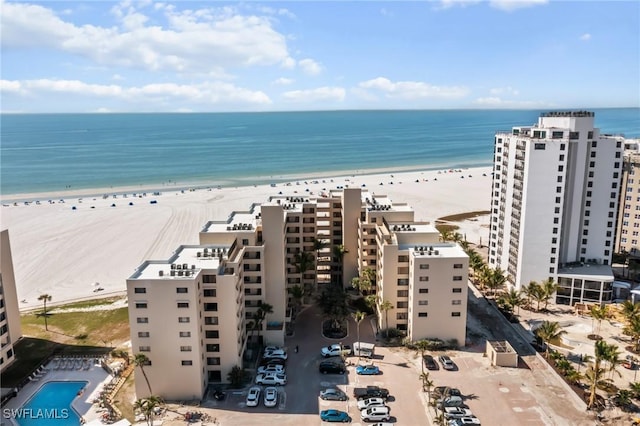 bird's eye view with a view of the beach and a water view