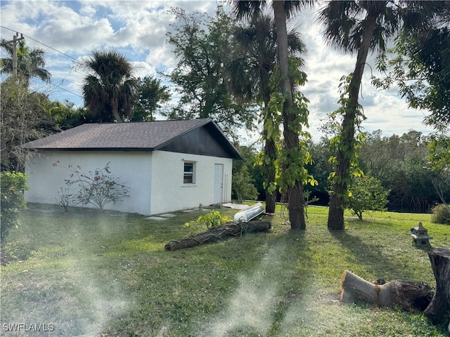 view of property exterior featuring a lawn