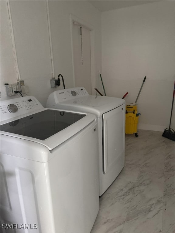 laundry area featuring washer and clothes dryer