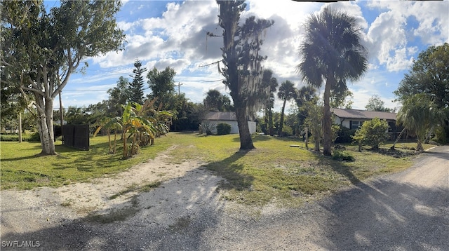 118 Brooks Rd, North Fort Myers, FL 33917 - exterior space featuring a front lawn