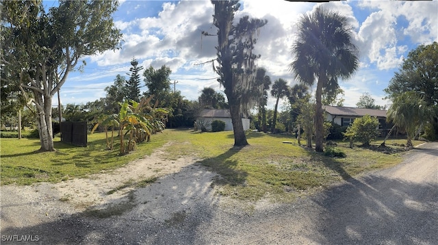 exterior space featuring a front lawn