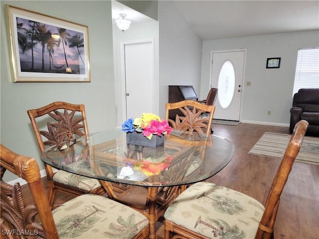 401 SE 8th Ter, Cape Coral, FL 33990 - dining area featuring wood finished floors and baseboards
