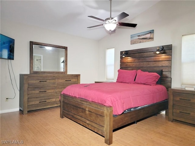 401 SE 8th Ter, Cape Coral, FL 33990 - bedroom with light wood-type flooring, lofted ceiling, baseboards, and ceiling fan