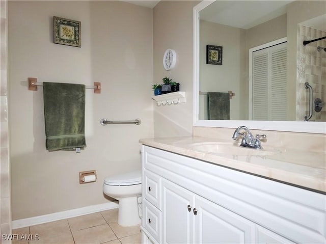 401 SE 8th Ter, Cape Coral, FL 33990 - bathroom with toilet, tile patterned flooring, vanity, tiled shower, and baseboards