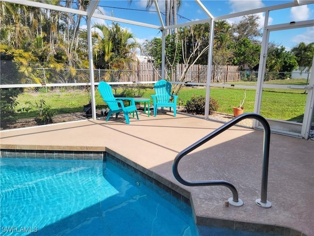 401 SE 8th Ter, Cape Coral, FL 33990 - view of swimming pool featuring a patio and glass enclosure