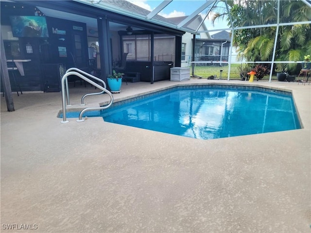401 SE 8th Ter, Cape Coral, FL 33990 - swimming pool with a patio area and glass enclosure