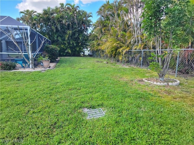 401 SE 8th Ter, Cape Coral, FL 33990 - view of yard with a lanai