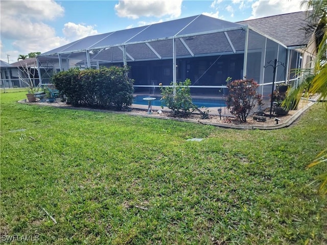 401 SE 8th Ter, Cape Coral, FL 33990 - view of grassy yard featuring glass enclosure