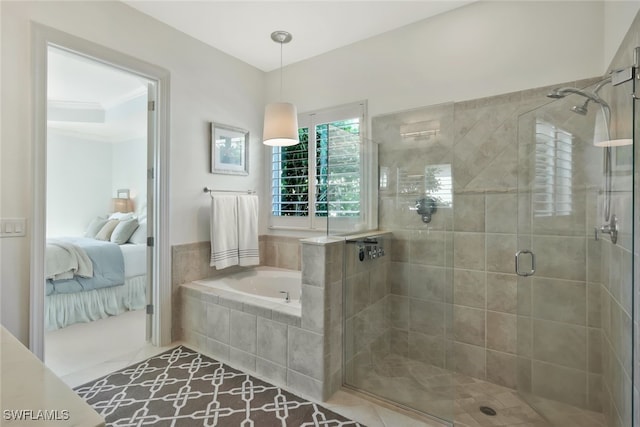 bathroom with crown molding and shower with separate bathtub