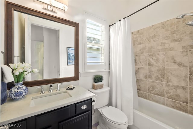 full bathroom featuring vanity, shower / tub combo with curtain, and toilet