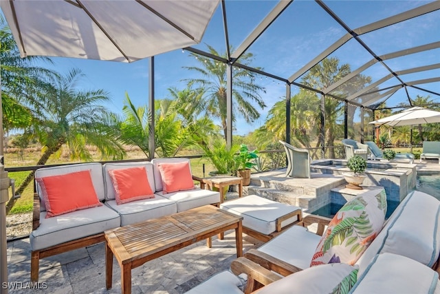 view of patio / terrace featuring a lanai and an outdoor hangout area