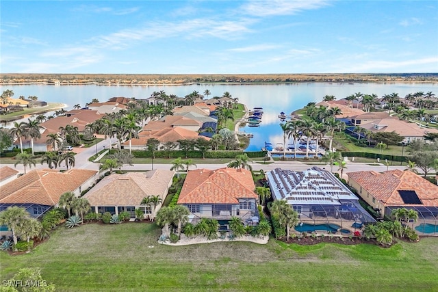 bird's eye view with a water view