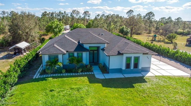 view of front of home with a front yard