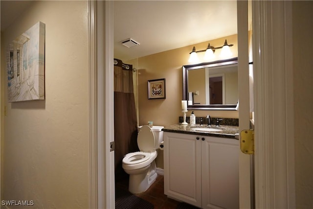 full bath with curtained shower, toilet, vanity, visible vents, and tile patterned floors