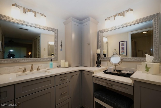 bathroom featuring visible vents and vanity