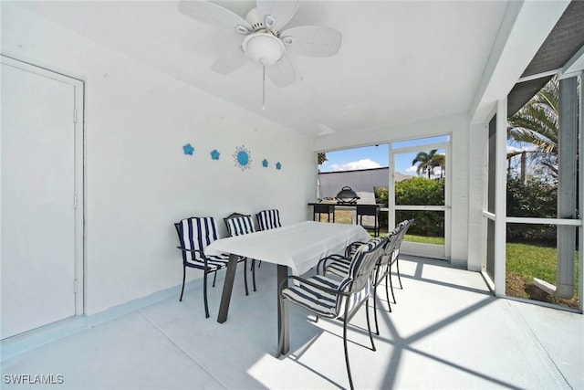 dining space featuring ceiling fan