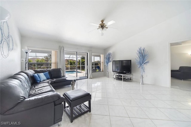 tiled living room with ceiling fan