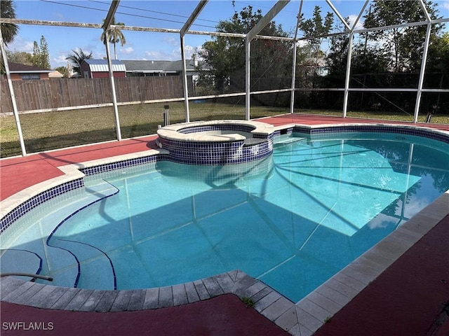 view of pool featuring an in ground hot tub and glass enclosure