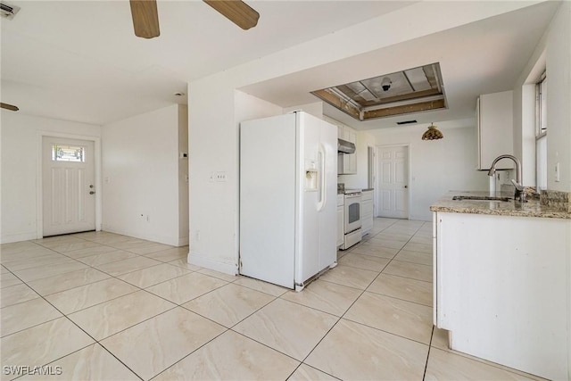 kitchen featuring white appliances, a ceiling fan, white cabinetry, and a sink