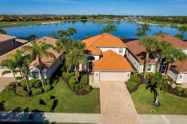 birds eye view of property featuring a water view