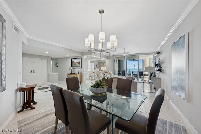 dining area featuring a notable chandelier, ornamental molding, and light tile patterned flooring