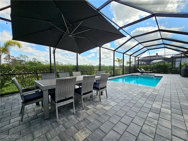 11637 Russet Trl, Fort Myers, FL 33913 - pool featuring glass enclosure, outdoor dining space, and a patio