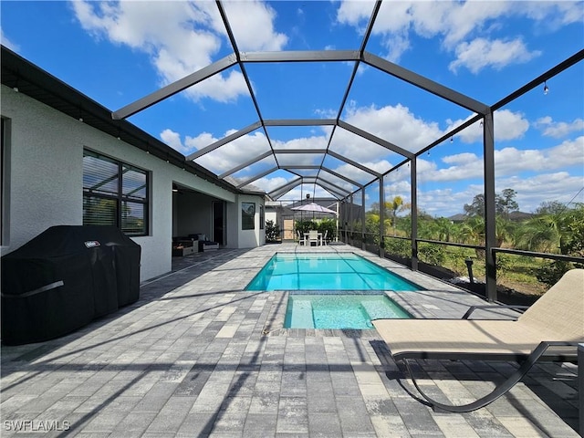 11637 Russet Trl, Fort Myers, FL 33913 - view of swimming pool featuring a lanai, grilling area, a patio, and a pool with connected hot tub