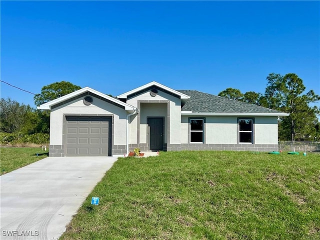 ranch-style house with a garage and a front lawn