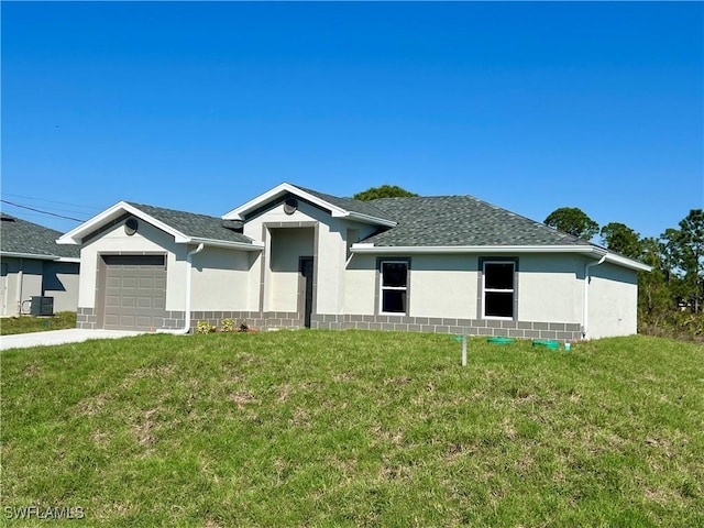 ranch-style house with a garage, central AC unit, and a front yard