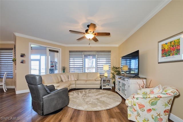 living room with ceiling fan, ornamental molding, and dark hardwood / wood-style floors